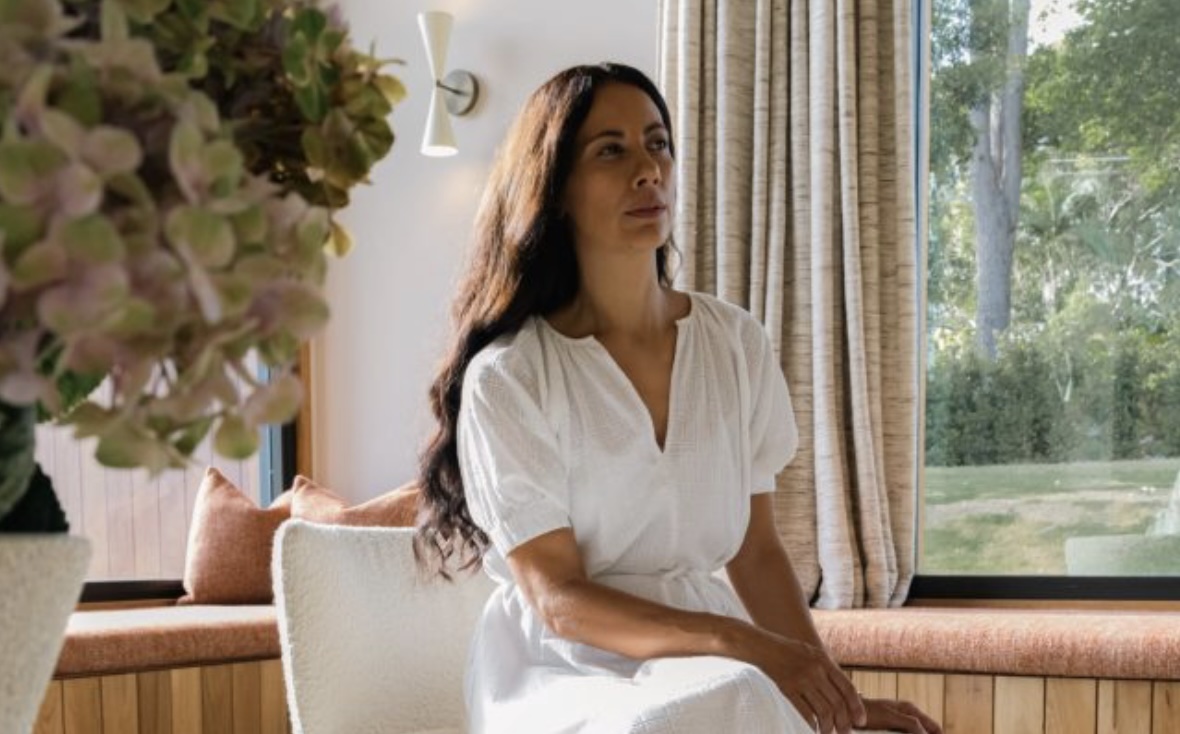 Kyah O'Connor holding a singing bowl